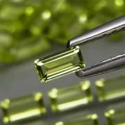 Dazzling 6.20ct untreated apple green Peridot set