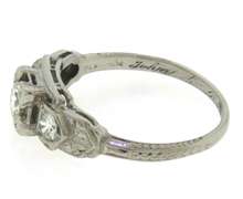 Charming Platinum Diamond Engagement Ring