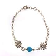 Sterling silver bracelet with light blue hearts and sun charms