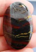 Dramatic 79.19ct Tiger Eye cabochon