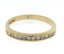 Eelgant Yellow Gold Diamond Channel Set Band