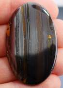 Dramatic 59.77ct Tiger Eye cabochon
