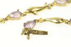 10K Yellow Gold Pear Amethyst Dolphin Link Chain Bracelet