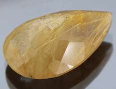 Fully faceted 23.95ct golden rutile Quartz