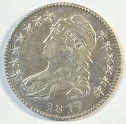 Lustrous AU 1817 Capped Bust Half Dollar. Cleaned