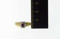 14K Yellow Gold Oval Ruby Diamond Accent Halo Grooved Ring