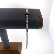 Sterling silver bracelet with red and silver beads