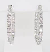Oval Diamond Inside Out Hoop Earrings in 18k