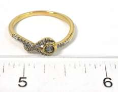 Understated Diamond Chip Ring in Yellow Gold