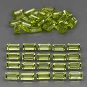 Dazzling 6.20ct untreated apple green Peridot set