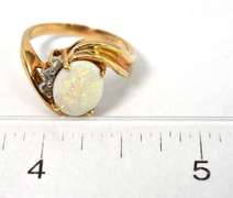 Enchanting Framed Opal & Diamond Ring in 14KT Yellow Gold