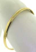 Powerful Yellow Gold Bangle Bracelet