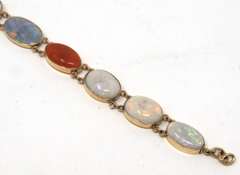 Dynamic Seven Bezel Set Shaped Cut Natural Multi Color Opals Bracelet