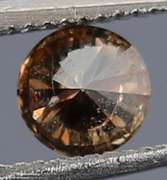 Glittering .21ct untreated rich chocolate Diamond