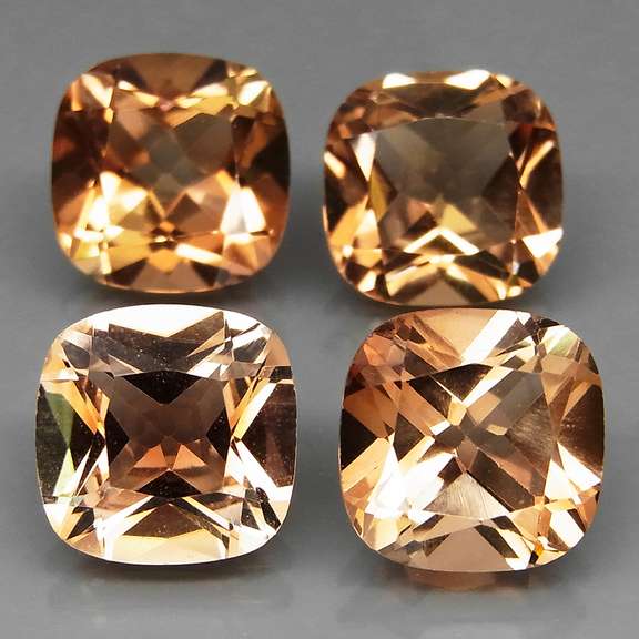 Gorgeous cushion cut 14.97ct Imperial Topaz set