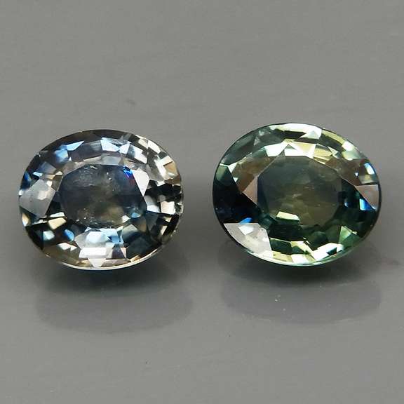Heated only 1.37ct blue green glittering Sapphire set