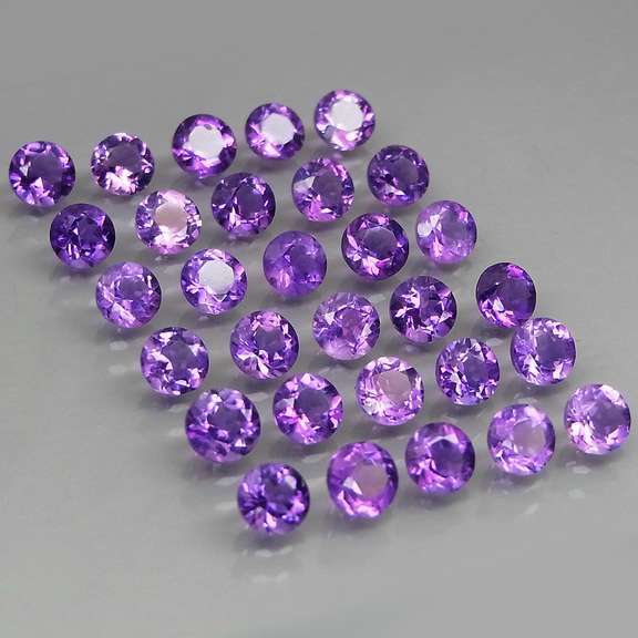 Glittering 7.59ct round cut Bolivian Amethyst set