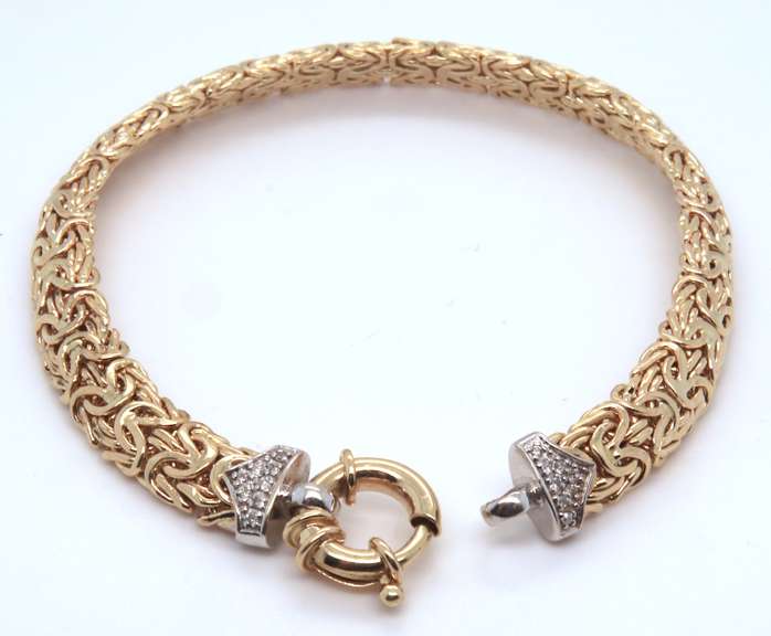 Dynamic Yellow Gold Byzantine Bracelet with Diamond accents