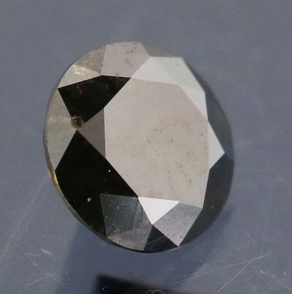 Very fine .35ct smooth cut Black Diamond solitaire