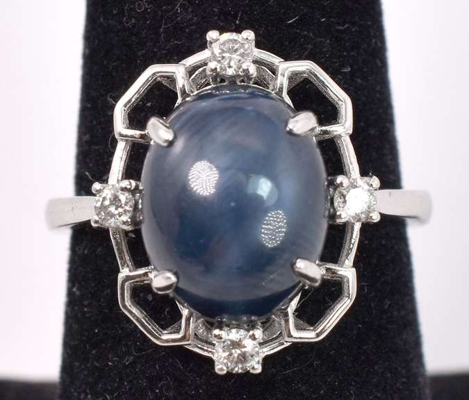 Darling 7.01CTS Cabochon-Cut Star Sapphire and 0.17CTW Diamond Ring in Sterling Silver