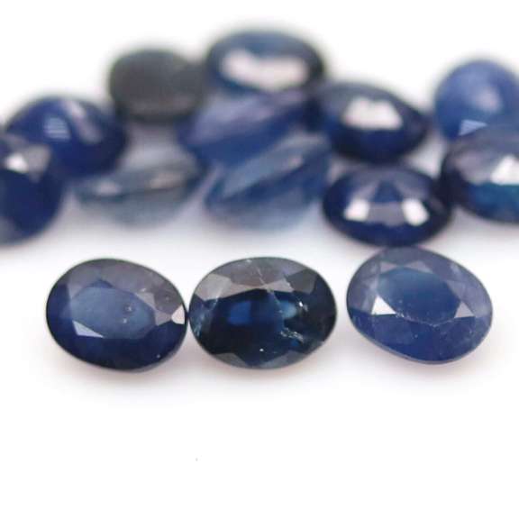 Stunning ink blue 7.22ct oval Sapphire set