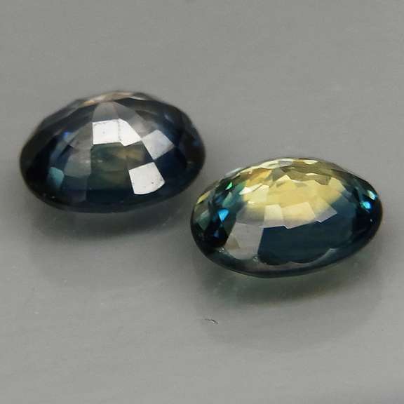Heated only 1.37ct blue green glittering Sapphire set