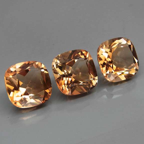 Matched! 3 piece 11.43ct full fire Imperial Topaz set