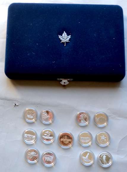 1992 Canada125 th Anniversary Set of 12 Silver Quarters & $ 1 Proof