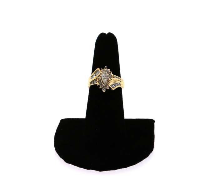 Dynamic 14k Gold Halo Diamond Ring with Baguette Diamonds