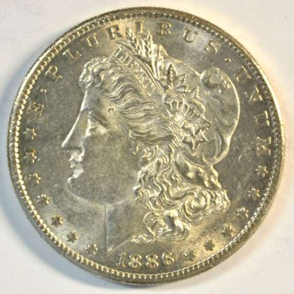 Frosty-white BU 1886-S Morgan Silver Dollar. Key date!