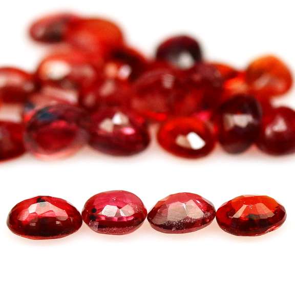Excellent 6.22ct set of oval cut red Imperial Sapphires
