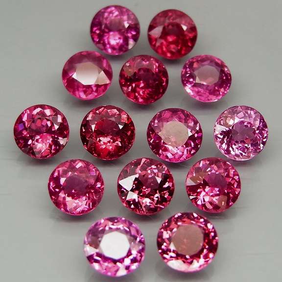 Ravishing 11.76ct violet pink Rhodolite Garnet set