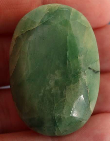 Heavy 162 oval cut forest green Emerald