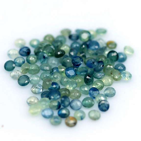 Heated only! 7.68ct blue green Sapphire set