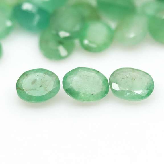 Oval cut 8.97ct Zambian Emerald set