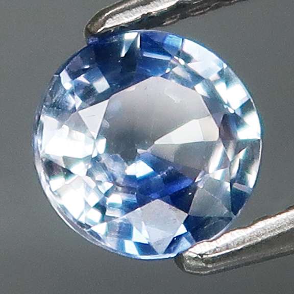 Heated only! 0.77ct bi-color calico Ceylon Sapphire solitaire