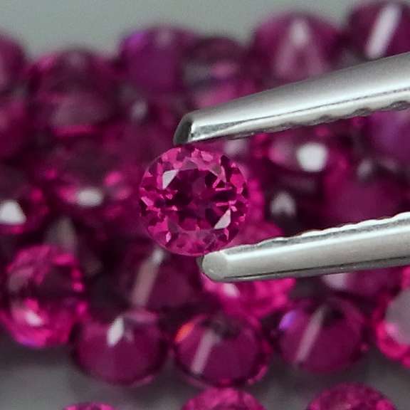 Ravishing 5.04ct hot pink Rhodolite Garnet set