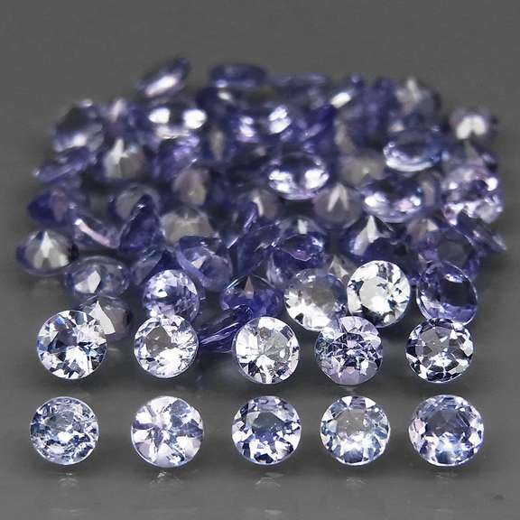 Glittering 4.86ct bright blue violet Tanzanite set