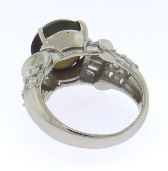 Shimmering Platinum Cabochon Chrysoberyl and Diamond Ring