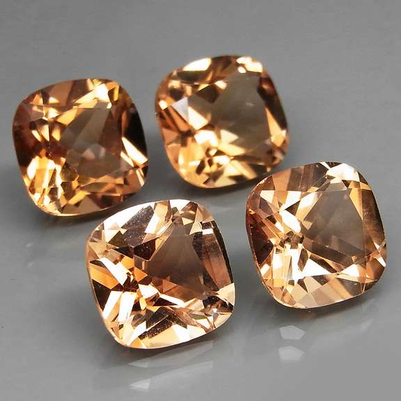 Gorgeous cushion cut 14.97ct Imperial Topaz set