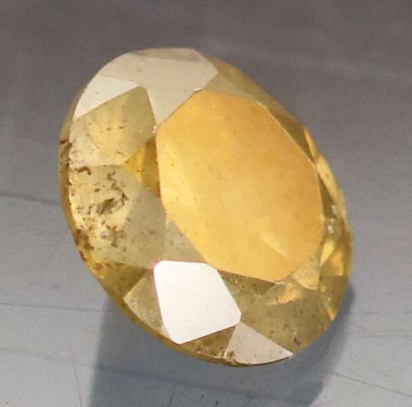 Eye catching 0.41ct golden orange Diamond solitaire