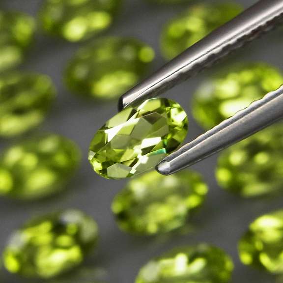 Dazzling 7.47ct untreated lime green Peridot set