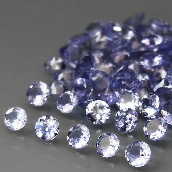 Glittering 4.86ct bright blue violet Tanzanite set