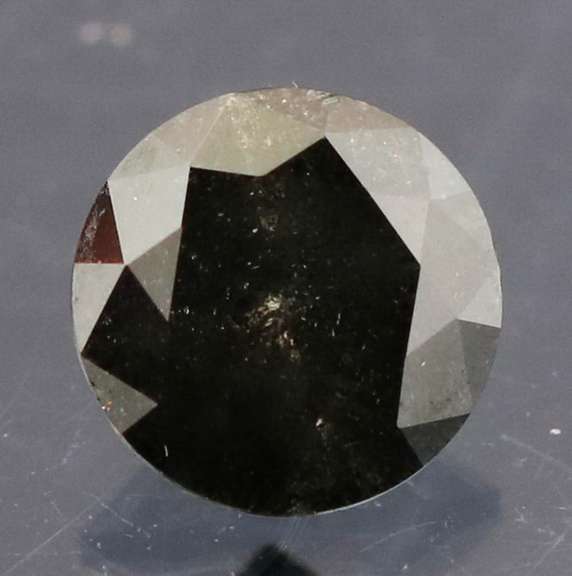Very fine .32ct smooth cut Black Diamond solitaire