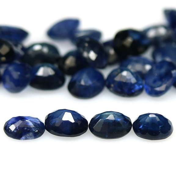 Stunning ink blue 8.64ct oval Sapphire set