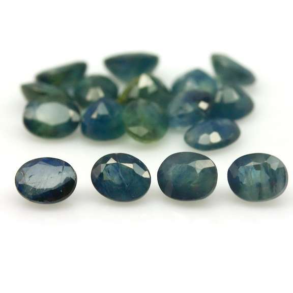 Heated only! 8.82ct blue green Sapphire set