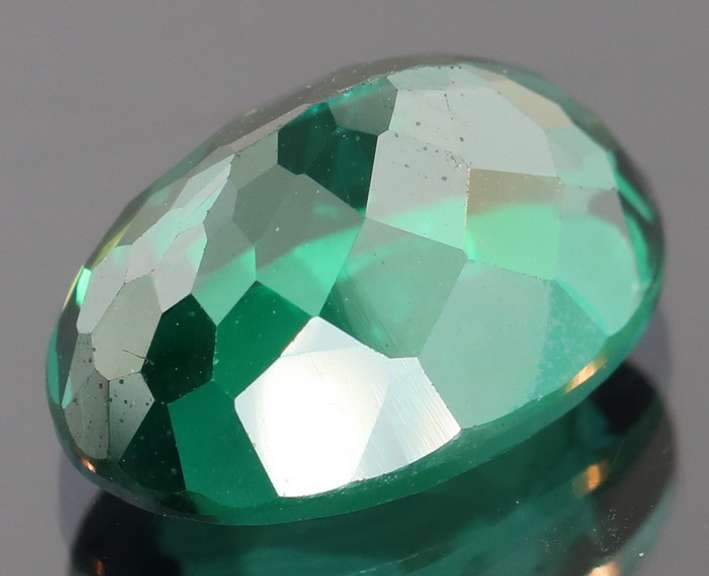 Attention grabbing 8.69ct emerald green Mystic Topaz