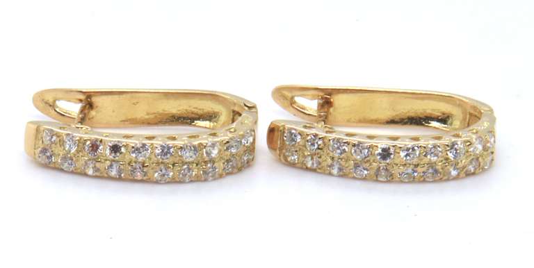 Fantastic 18kt Channel Set Round CZ Earrings