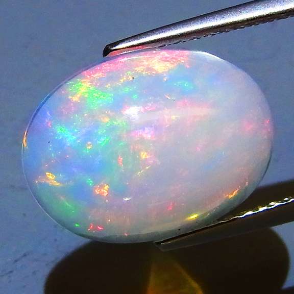 Vibrant 3.75ct rolling floral flashing Welo Opal