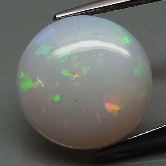 Magnificent 9.37ct disco flashing Welo Opal
